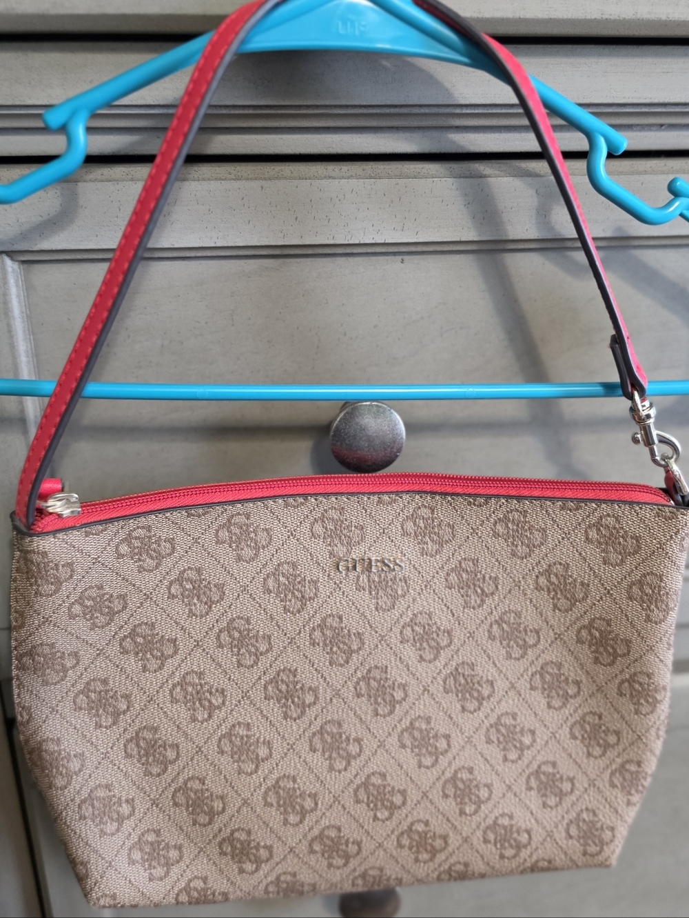 Guess Logo Print Wristlet in Beige with Pink Trim